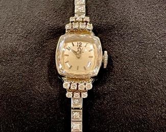 SOLD Vintage Ladies Omega wristwatch. Stamped 14K White Gold, authentic round brilliant diamonds. Winder and works! 