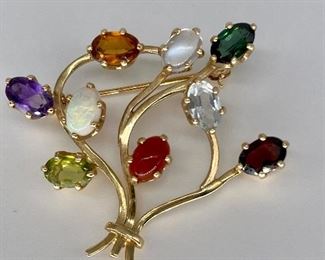 $250. Vintage gemstone cluster pin, Marked 14K. Approx 1.5"  at it's widest. Ex condition! 