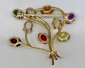 $250. Vintage gemstone cluster pin, Marked 14K. Approx 1.5"  at it's widest. Ex condition! 