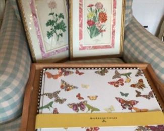 Mackenzie Childs cork-backed placemats.  Designer-framed botanicals.