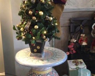 Two of two Mackenzie Childs ceramic tables/seats.