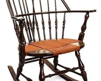 Sikes Chair Co., Buffalo, NY - Antique Braced Bow Back Windsor Rocker with Rush Seat. Mid to Late 19th Century.