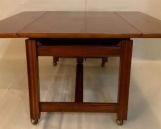 Lowered View with sides open:  Baker Furniture Co. USA Convertible 3-in-1 Table.  Drop Leaf 36” Square Luncheon/Game Table, Folds down  to a Drop-Side 18”H Coffee Table