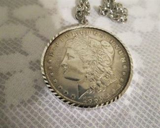 1885 Morgan silver dollar with sterling silver chain. $150