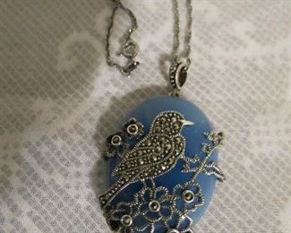 Sterling silver marcasite chalcedony bird pendant necklace. $65