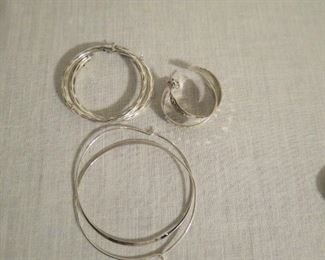 Sterling silver pierced earrings.