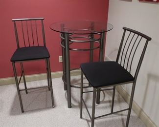 54  Amisco           counter height  table and two chairs   200.00