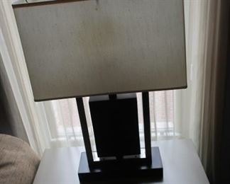 65   Pair  of brass  and  metal  lamps             200.00 for the pair