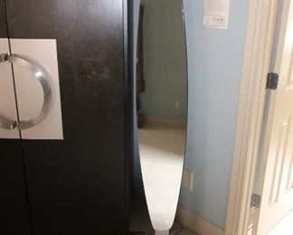 69     Oval  mirror  70"  x  11"      75.00