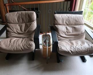 75    beige  leather  chair  that swivels     32"  wide            250.00  each 
