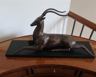 85   Bronze  antelope on stand      17" across  (not  signed)  95.00
