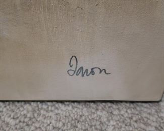 signature  on  large  art  piece