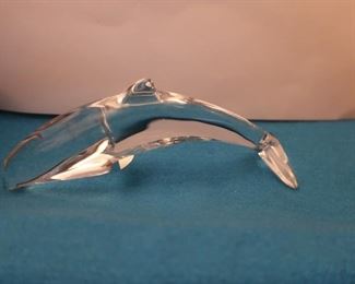 129   Baccarat  dolphin   -tail  down   it  is  signed.  The size  is 6 1/8"   x  2 1/4"          50.00