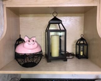 Candle lanterns. Pig lidded basket