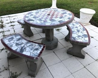 Concrete patio table with three benches