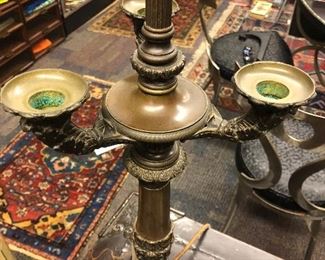 One of a pair of bronze lamps