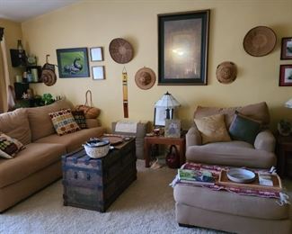 Sofa and Chair with ottoman, wood travel trunk, Wall decor and art