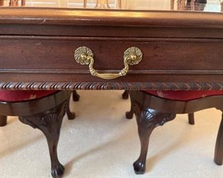 Dining Room:  Each end of the HENREDON dining table has a shallow drawer where you can store flatware, napkin rings, etc.  Notice the carved detail on the border of the table.