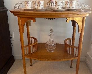 Dining Room:  An antique Bird's Eye Maple table displays a chocolate set and decanter.