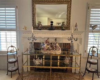 Living Room:  Two separately priced [almost identical] antique cake stands flank a classic French "Bague"-style brass and glass console table.  The mirror (46" x 34") above the mantel has a 5" ornate gold frame.  Closer photos of the console table and some of the other items follow.