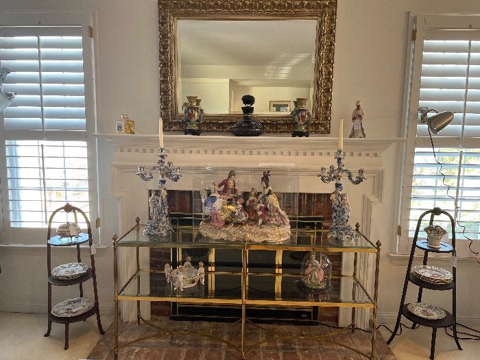 Living Room:  Two separately priced [almost identical] antique cake stands flank a classic French "Bague"-style brass and glass console table.  The mirror (46" x 34") above the mantel has a 5" ornate gold frame.  Closer photos of the console table and some of the other items follow.