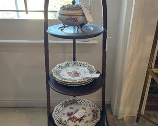 Living Room:  The antique cake stand on the left displays several DRESDEN and SCHUMANN porcelain pieces.  