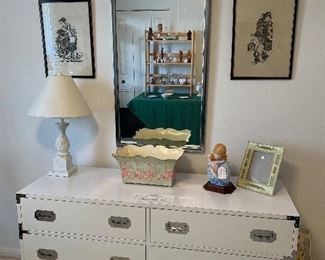 Bedroom #1:  A contemporary-style chrome frame mirror (20" x 48") pairs well with the vintage white DIXIE/chrome handle campaign-style dresser.  The decorative items are also for sale -- some closer photos follow.