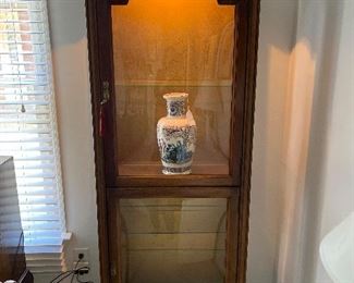 Bedroom #1:  Each separately priced arch top, lighted  curio cabinet measures  28" wide x 13" deep x 73" tall and has adjustable glass shelves.