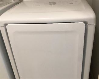 Hall (main floor--no steps!):  A SAMSUNG electric dryer (MoistureSensor SmartCare) is dated 2021. 