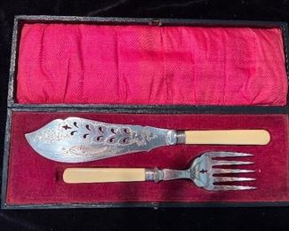 Living Room:  An antique English fish set is in its original box.  It has sterling ferrules.