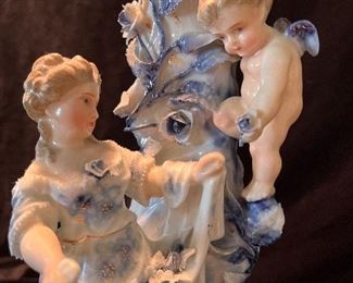 Living Room:  You can now see a little more detail on one of the German porcelain candleholders:  A woman and a cherub.