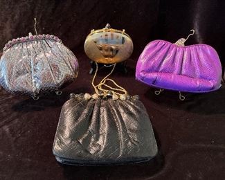 Living Room:  Four vintage Judith Lieber purses are each priced.