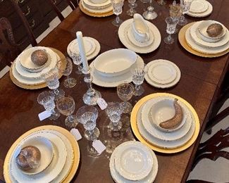 Dining Room:  The HENREDON ("Rittenhouse Square") dining table set includes eight chairs.  It is shown with a very elegant, neutral LENOX china to which we added seven pieces of gold metallic Murano glass fruit.  Closer photos are coming up.