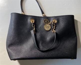 $150 Michael Kors Black Leather Handbag 19 x 11 x 6 Inches Please text or call 7032689529 for inquiries, or visit Tysons Jewelry located at:
8373 Leesburg Pike #12, Vienna Virginia 22182
Robert, the owner of Tysons Jewelry, has over 30+ years working in the jewelry business and has verified the authenticity of this listing.
Robert buys gold and precious metals at 95%. Please use the link: https://tysonsjewelry.net for specific prices.
Inquiries regarding gold, silver, precious metals, coins, watches, diamonds, cars, and collectibles are welcome!