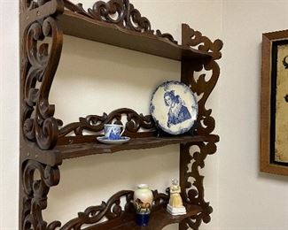 Carved hanging shelf