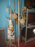 Groovy retro pole lamps and wooden coat rack.