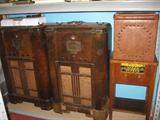 Antique floor radios.