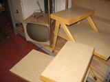 Mid century tables and a cute retro TV.