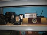 Vintage radios, receivers, intercom system and antennas.