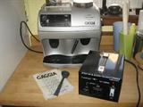 Gaggia Syncrony Logic coffee machine. Comes with electric converter.