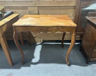 Lot #105, Vintage Side Table with Carved Motif, $75