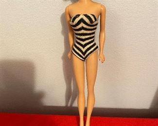 Vintage 1960's Brunette Bubble Cut Barbie. Original Black .White Swimsuit, Black Open Toe Shoes. Stamped Japan on Foot.