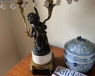 Bronze on gilt Cherub double pull lamp and blue and white ginger jar on carved entryway table that converts and extends to a game table.