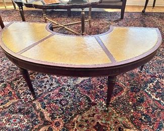 Vintage Leather-topped Weiman half moon table with drop downs on casters 