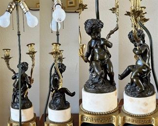 Bronze cherub on gilt base double pull lamp with shade
