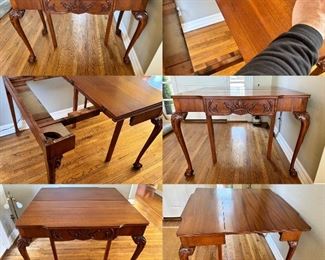 Carved entryway table that converts and extends to a game table: leaf flips over and table extends f