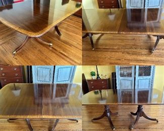 Henredon double pedestal mahogany dining table with 3 leaves.