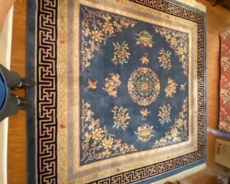 100% wool hand woven Persian rug about half inch thick. Size 10’x10’. Bought at San Marino rug shop in 1990.