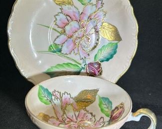 Trimont floral hand painted teacup and saucer