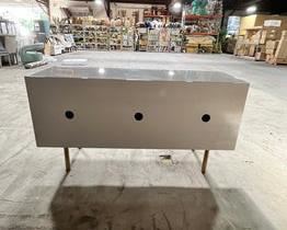 $2000 Sunpan Dorada Media Stand - HOP10411323-2 Description: Effortlessly modern with a refined silhouette, this impressive sideboard will add style to any space. Crafted from a wood frame with a high gloss grey finish. Features three cabinets with a linear design. Completed with gold stainless steel hardware. Materials: Wood and Stainless steel
Dimensions: 57.25W x 19.50D x 30.00H in Color/Finish: Gold and Grey
Condition: Like new condition. Used only for staging purposes with only one very minor superficial nick, see photos for details.
Location: Local pick up Portland, OR 97202. Contact us or go to our website and use the
"Need a shipper" tab to access our list of suggested local and national providers. https://goodbyhello.com/products/copy-of-rove-concepts-square-marble-coffee-table-hop10411323-1?_pos=1&_sid=4b46cc3a7&_ss=r